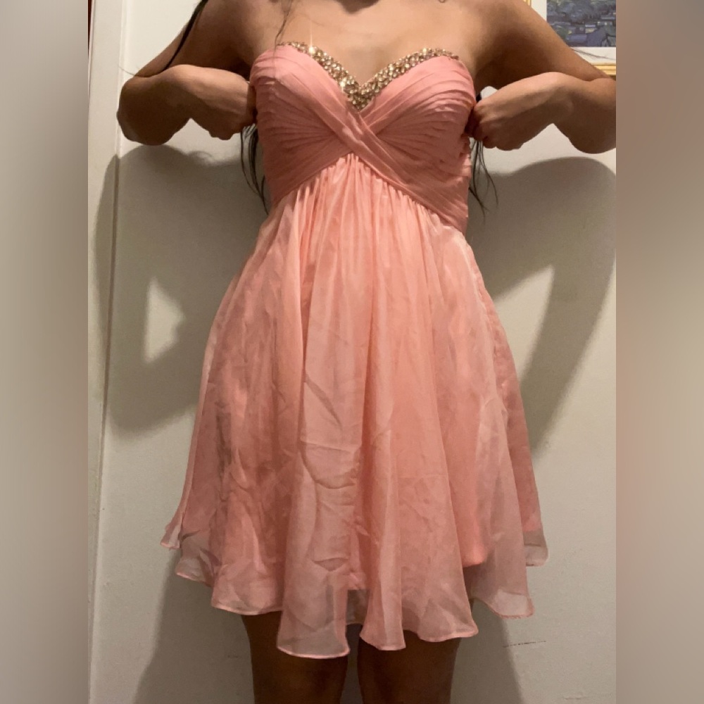 Pink with rhinestones midi dress can be worn multiple different occasions